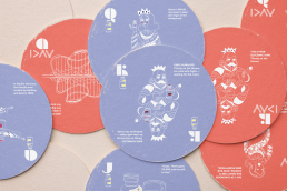 Colorful mockup of educational diabetes playing cards arranged in overlapping circles. The cards feature playful, hand-drawn illustrations and typography explaining Type 1 diabetes concepts—insulin, hypo and hyperglycemia, glucose, and family support—designed for children and parents.